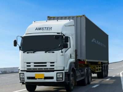 amster movers no.1 reliable packers and movers in dubai truck on road